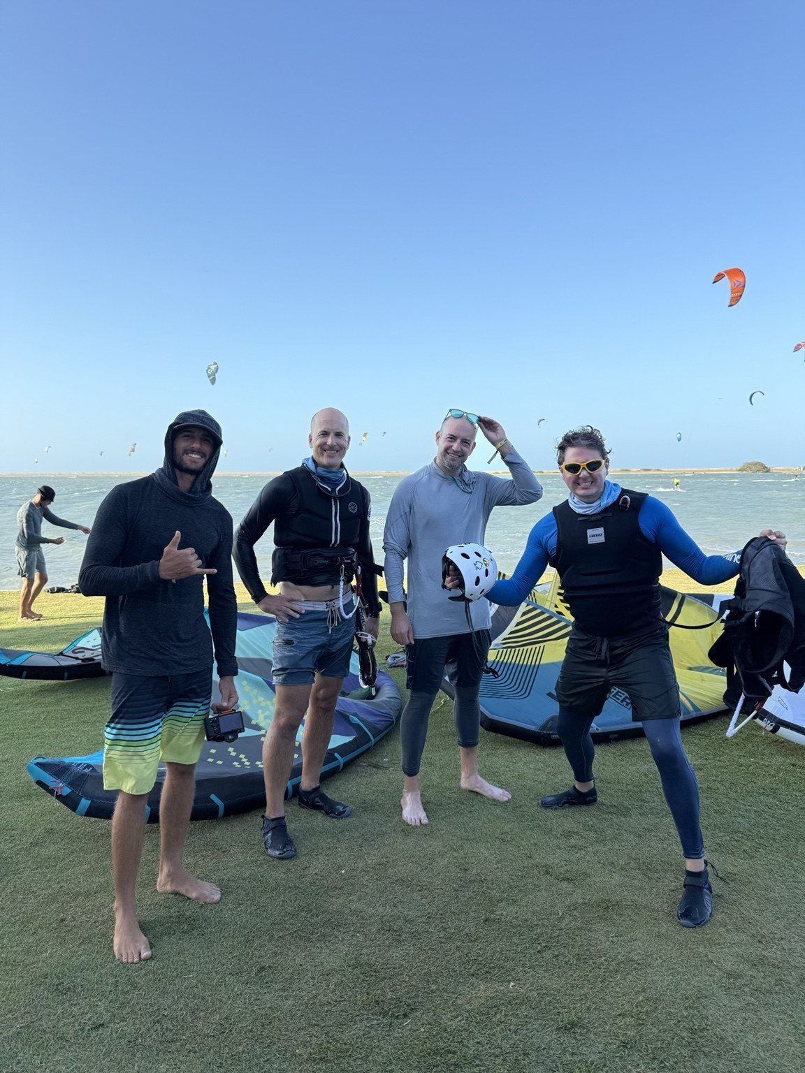 Friends ready for a kiteboarding day